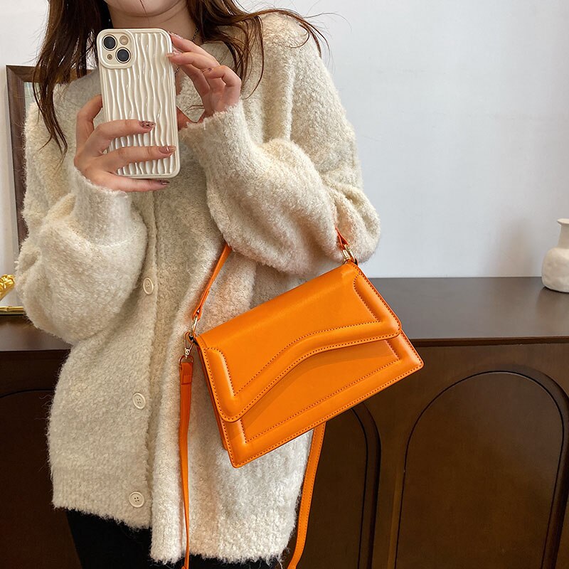 Bolsa-Feminina-de-Mao-e-Ombro-Laranja