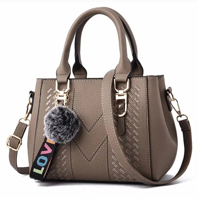 Bolsa de Couro Pompom Feminina