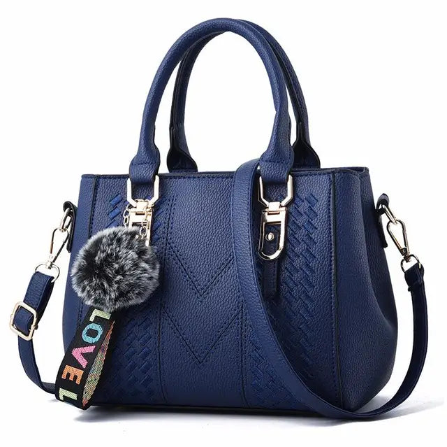 Bolsa de Couro Pompom Feminina