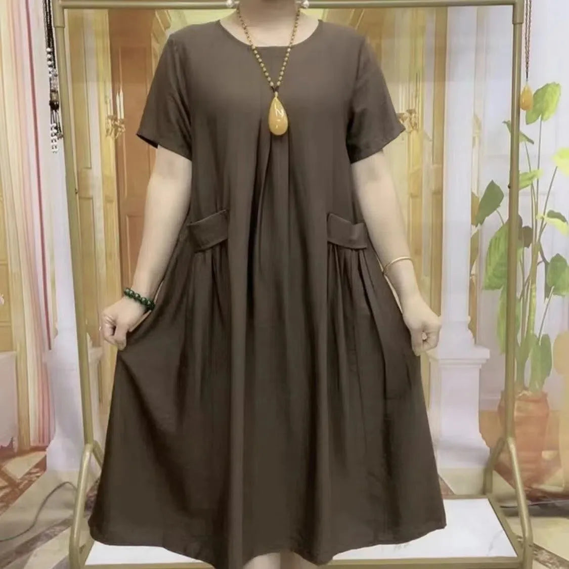 Vestido Soltinho Midi com Bolsos