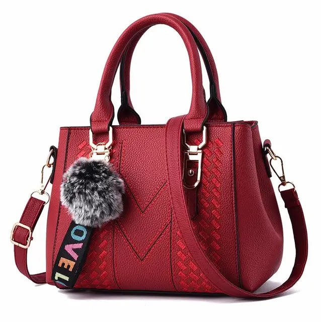 Bolsa de Couro Pompom Feminina